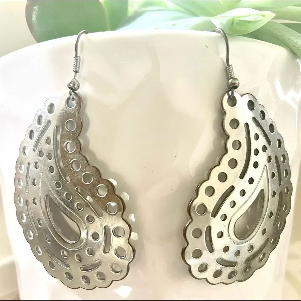 Silver tone paisley statement earrings